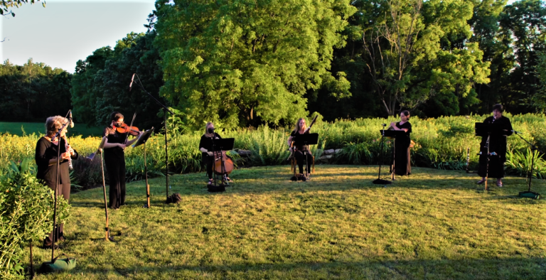 The Oakwood Chamber Players preforming on the prairie